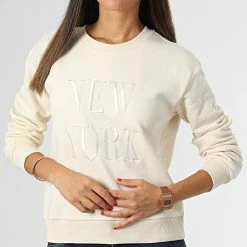 Bon marché ⌛ Sweat Crewneck Femme New York Beige de Only 👏